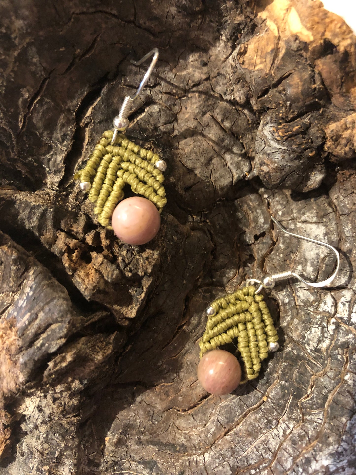 Rhodonite crystal and olive green thread earrings.